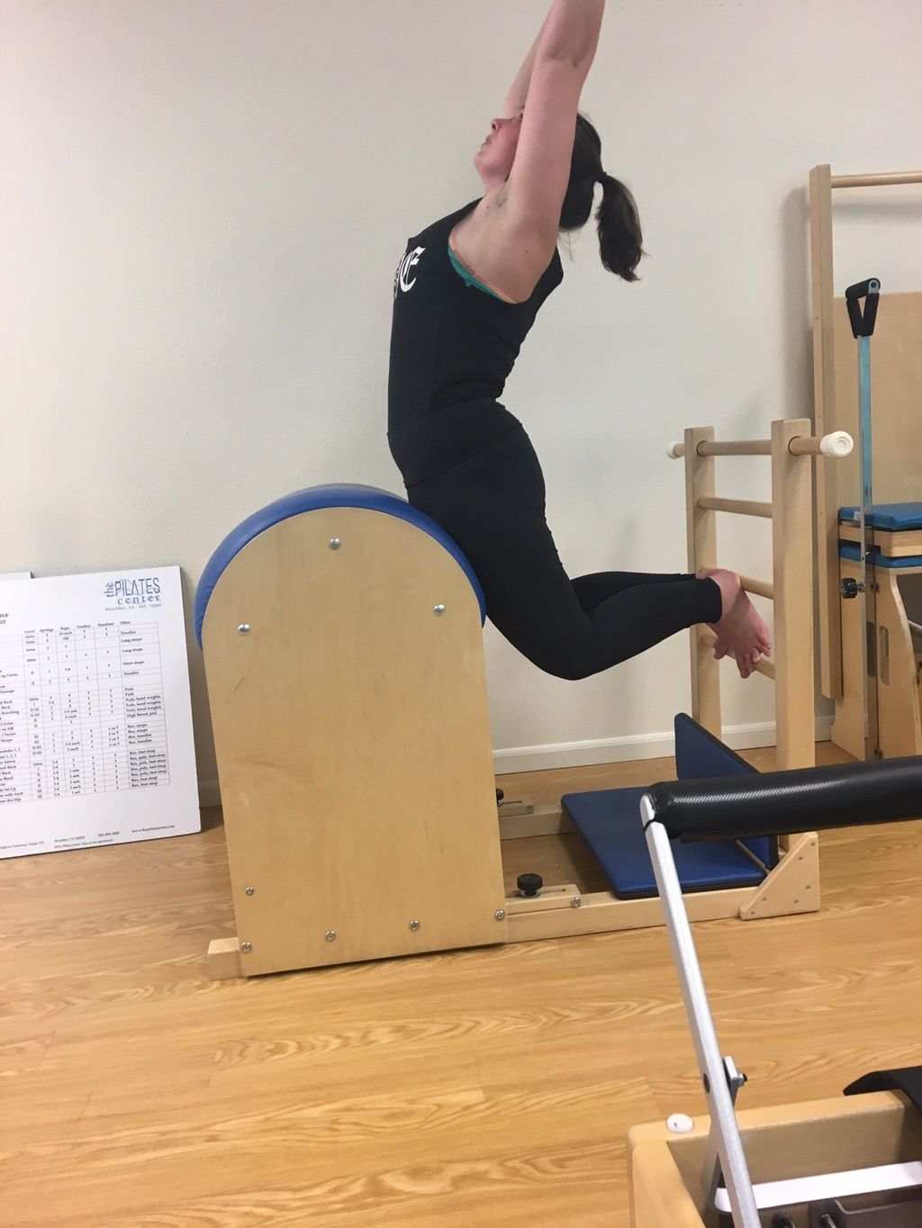 The Swan exercise on the Pilates Ladder Barrel, a 