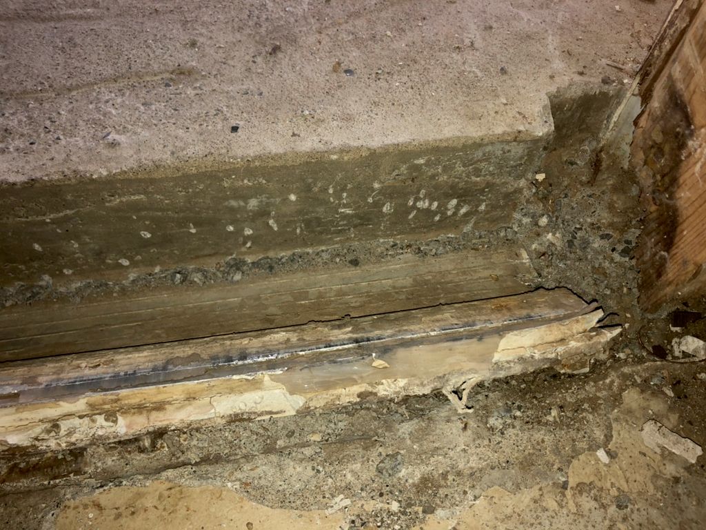 Customer had 4” of concrete on top of threshold. 