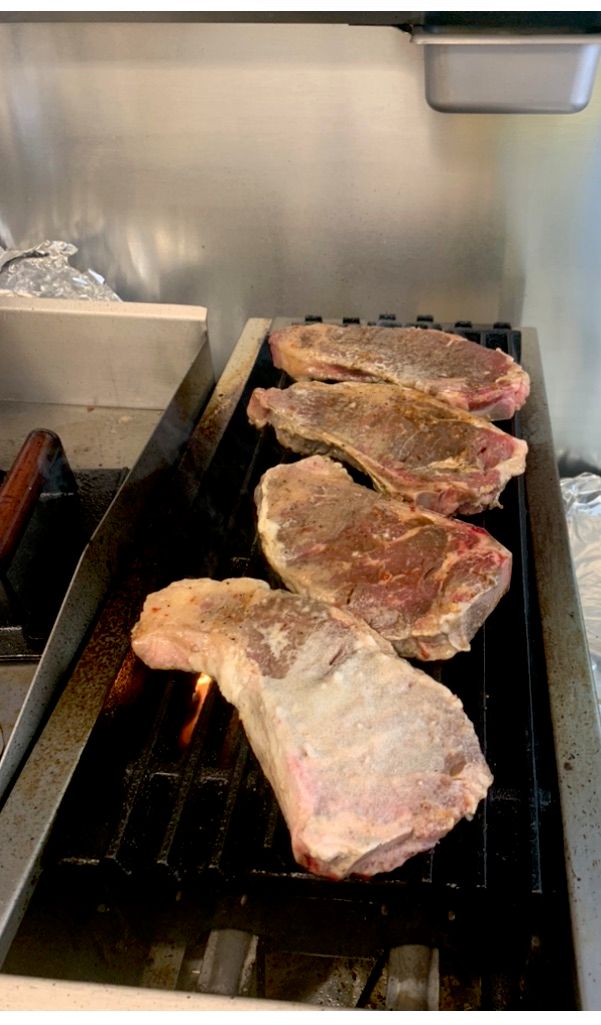 Charbroiled juicy seasoned steaks, cooked medium 