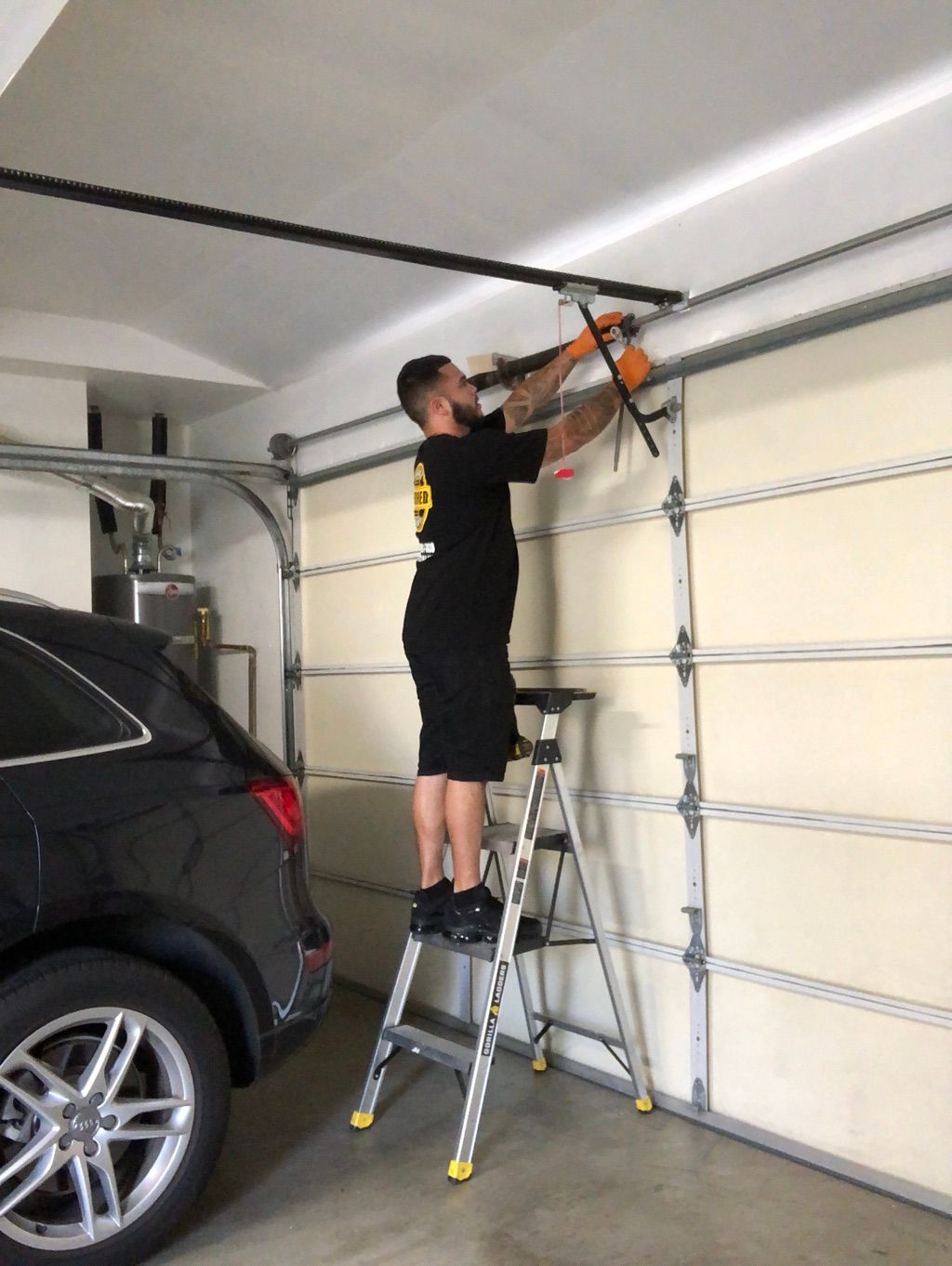 Technician Joseph replacing springs on Labor Day.