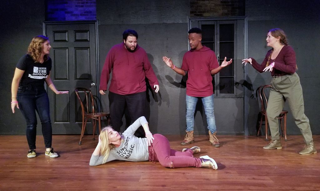 Onstage at the Chicago Musical Improv Festival Win