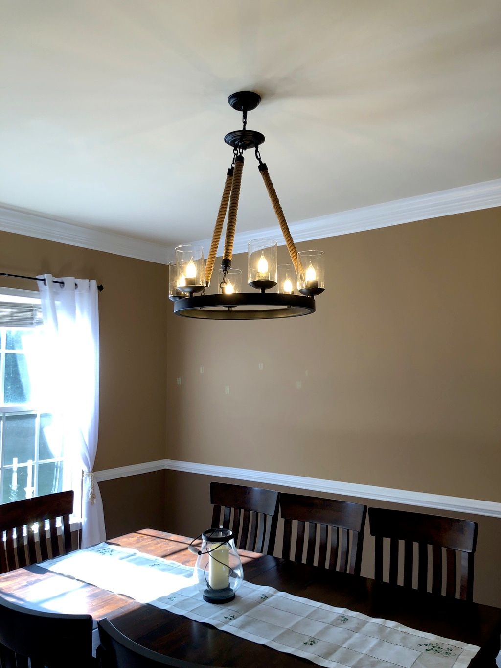 Jacob replaced the ugly bland dinning room light w