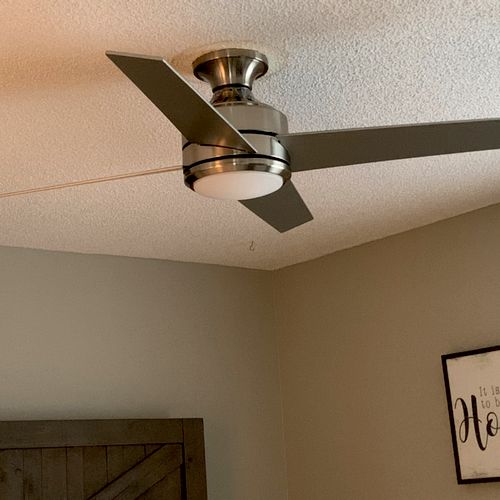 Prince installed a light fixture and a ceiling fan