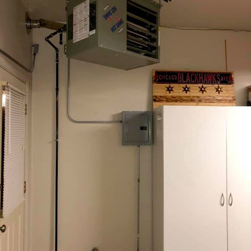 Unit heater and sub-panel installation