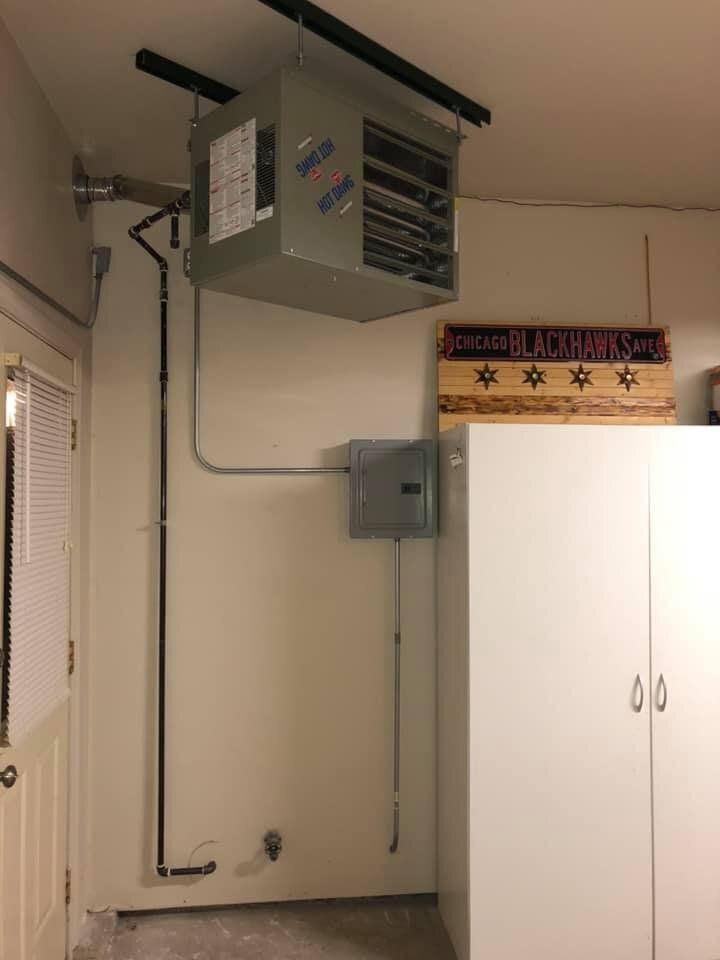 Unit heater and sub-panel installation