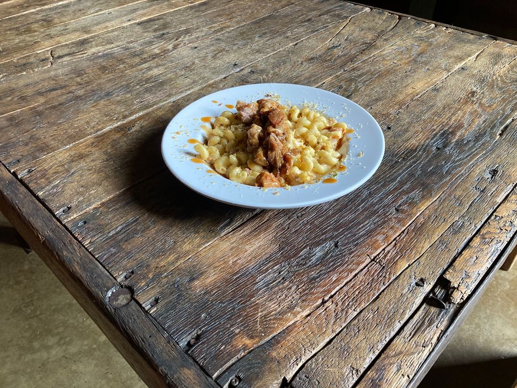 Double bacon, cheddar Mac & Cheese dish with garli