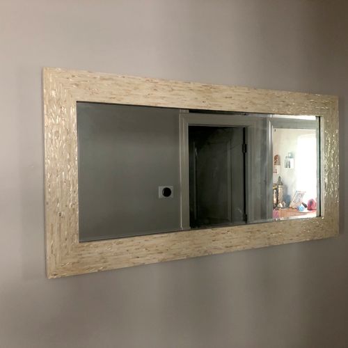 Andrew put up a mirror in our hallway.   He did an