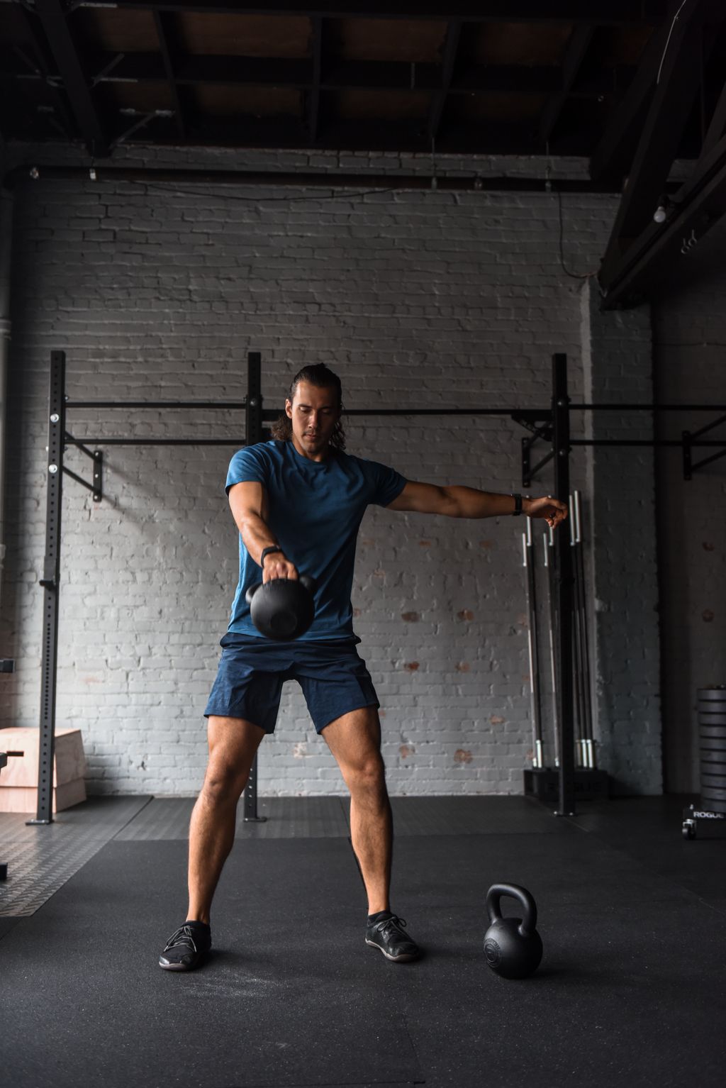 Coach Thomas Demonstrating a Kettlebell Swing