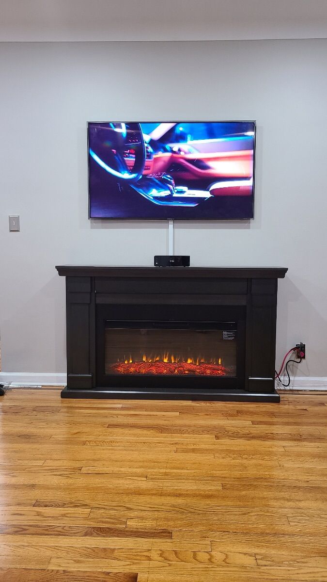 55 inch with fireplace.  Fireplace was assembled a