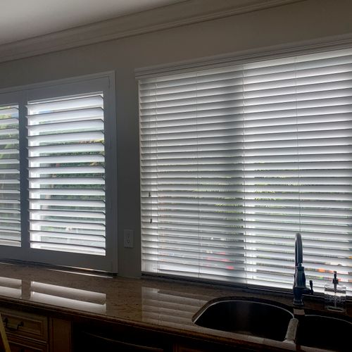 Old Blinds on the right compared to new shutters o