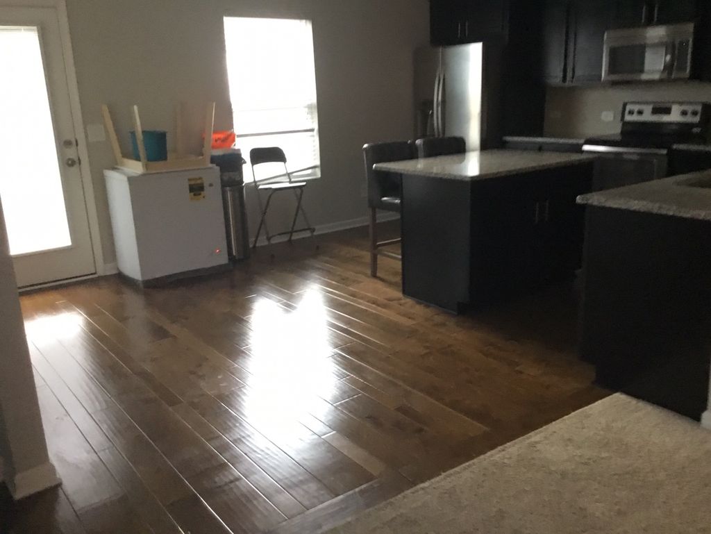 cleaning of kitchen, mop and floor waxing.