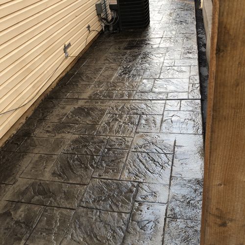 dark grey stamp brick form walkway
