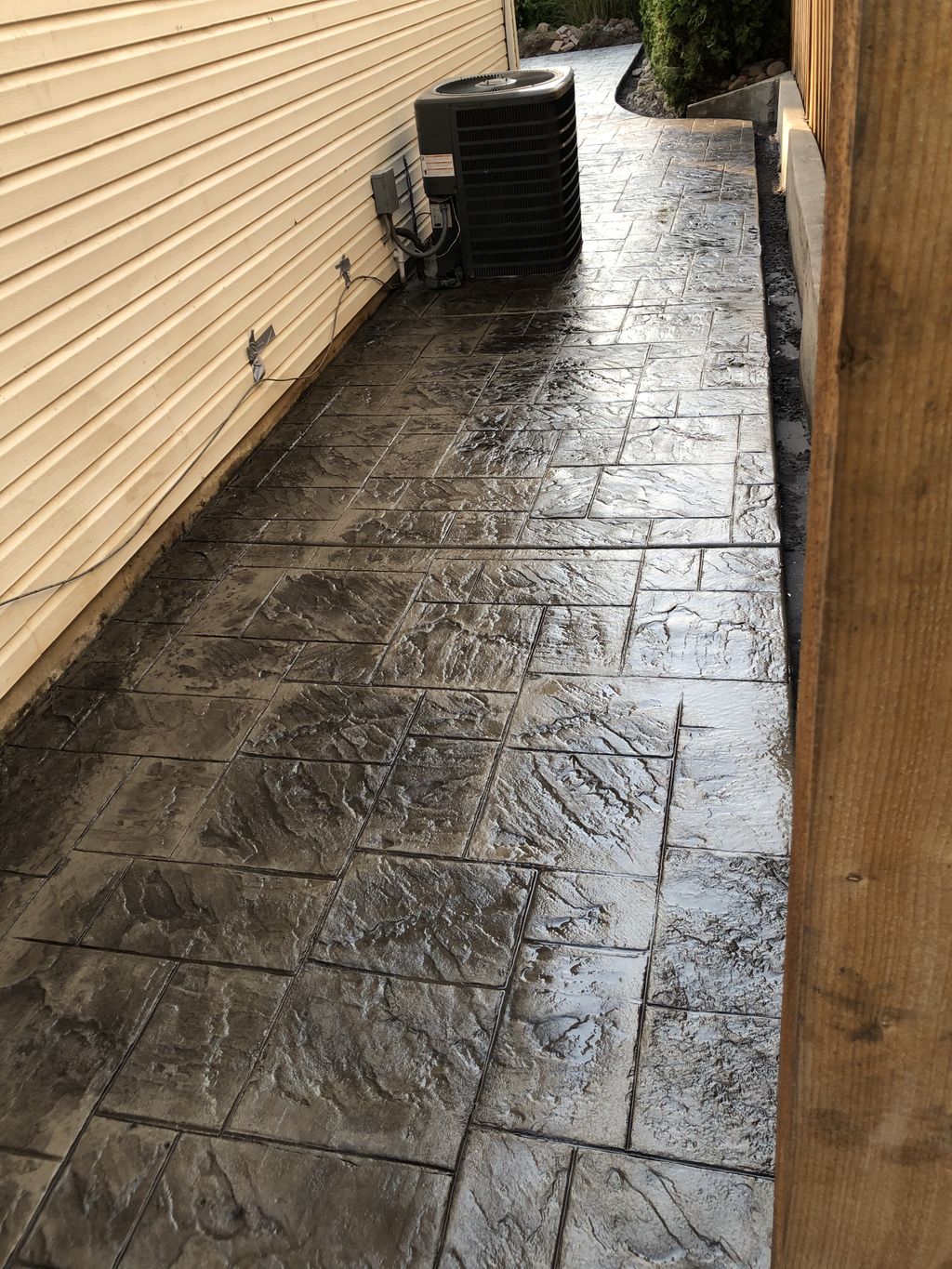 dark grey stamp brick form walkway