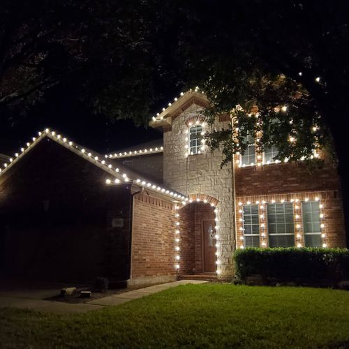 David installed our Christmas lights on our home. 
