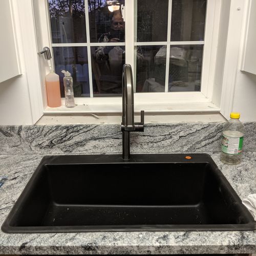 New sink in new granite countertops