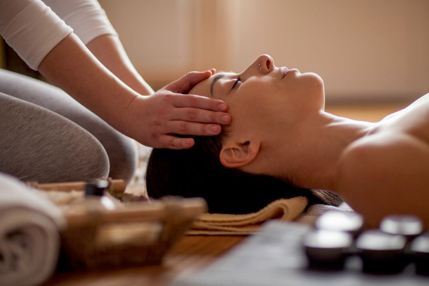 woman receiving a head massage