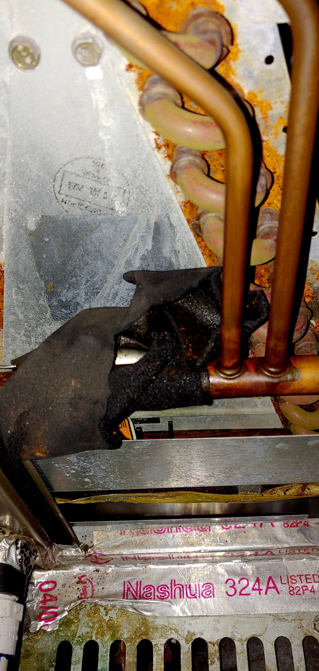 Leak search uncovered leaking evaporator coil