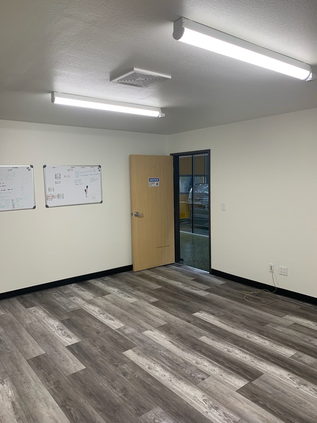 After- Installed new flooring and baseboard (offic