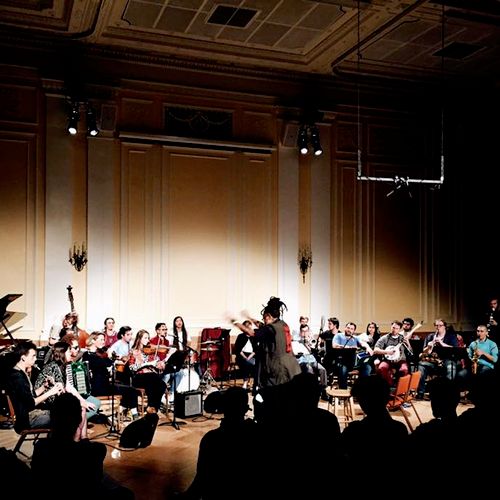 large ensemble performance, conducted and devised 