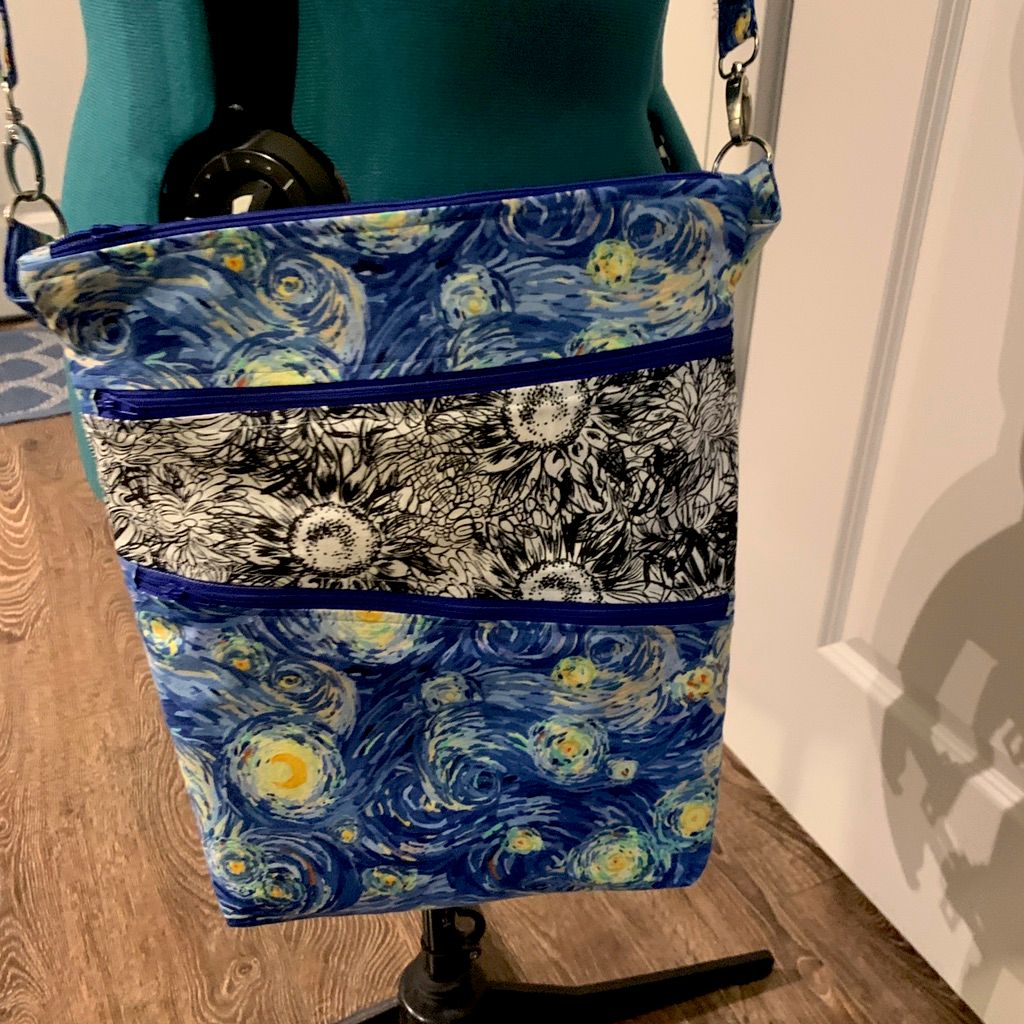 This Van Gogh inspired cross body bag features an 