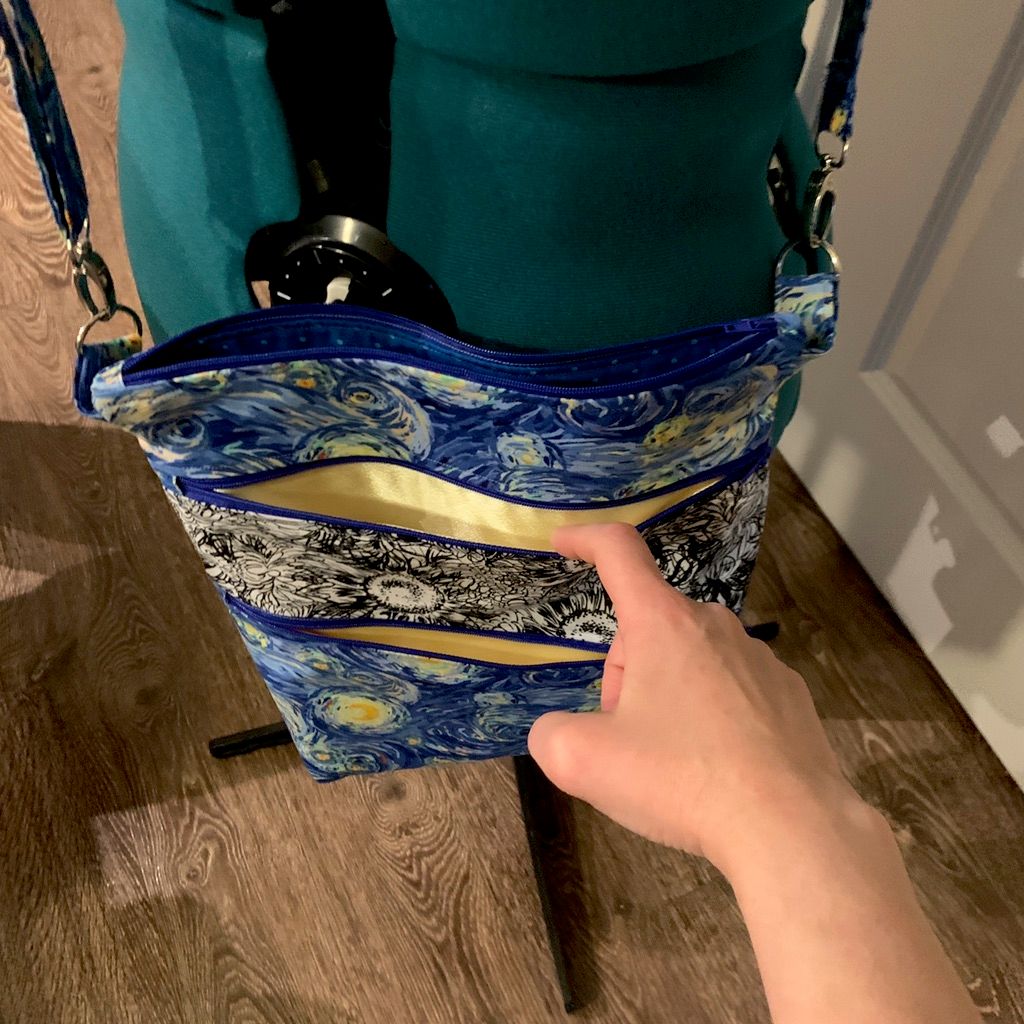 Another look at the bag and its multiple zipper co