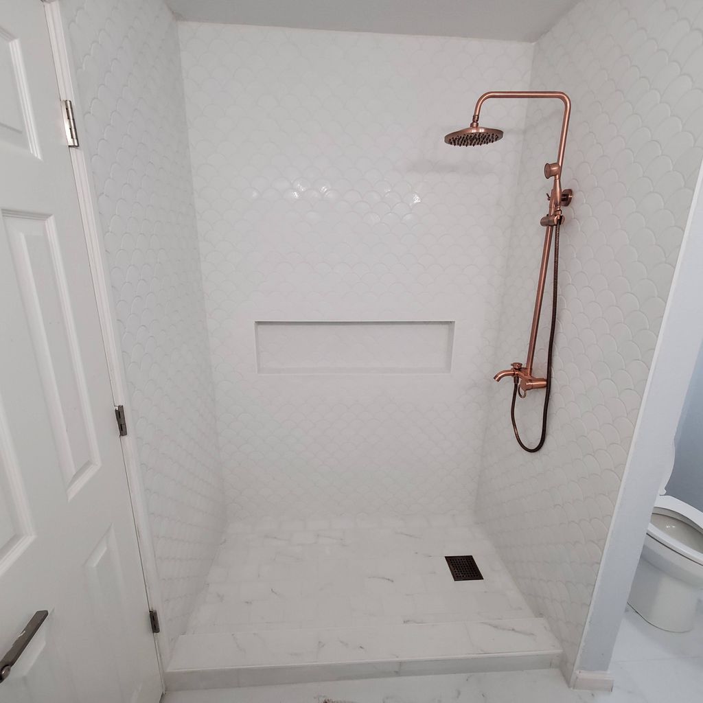copper fixture and new shower from tub set up