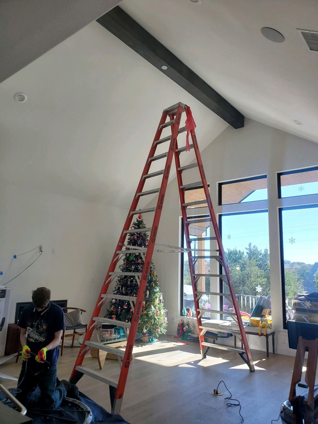 Installation of a Chandelier on a 16ft ceiling