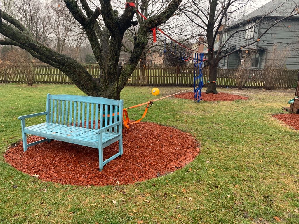 Jose came with 7 yards of mulch to add to our gard