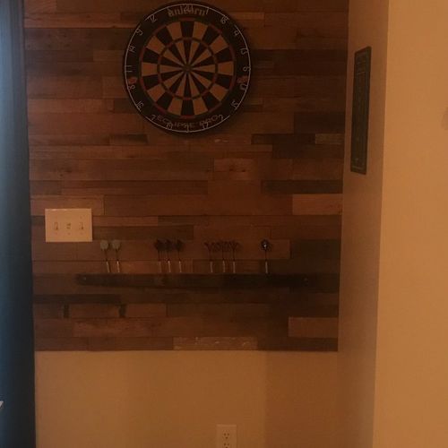 Nick installed reclaimed wood planks on my wall as