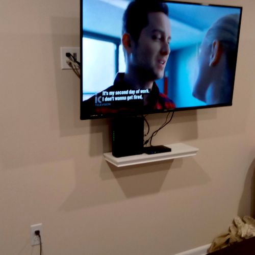Tv outlet, cables in wall, tv hanging $300