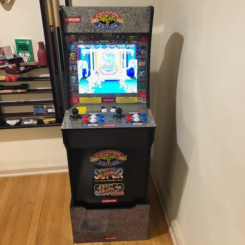 Yoland helped put 2 arcade games together for Chri