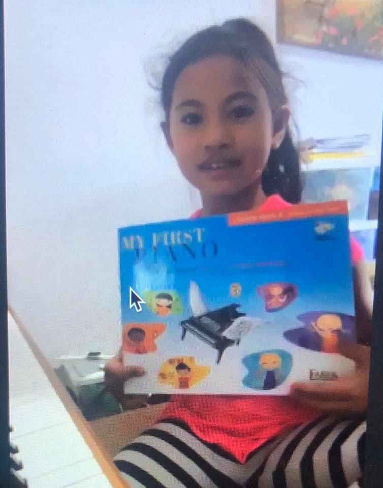 6 year old just got her new My First Piano Book Ad