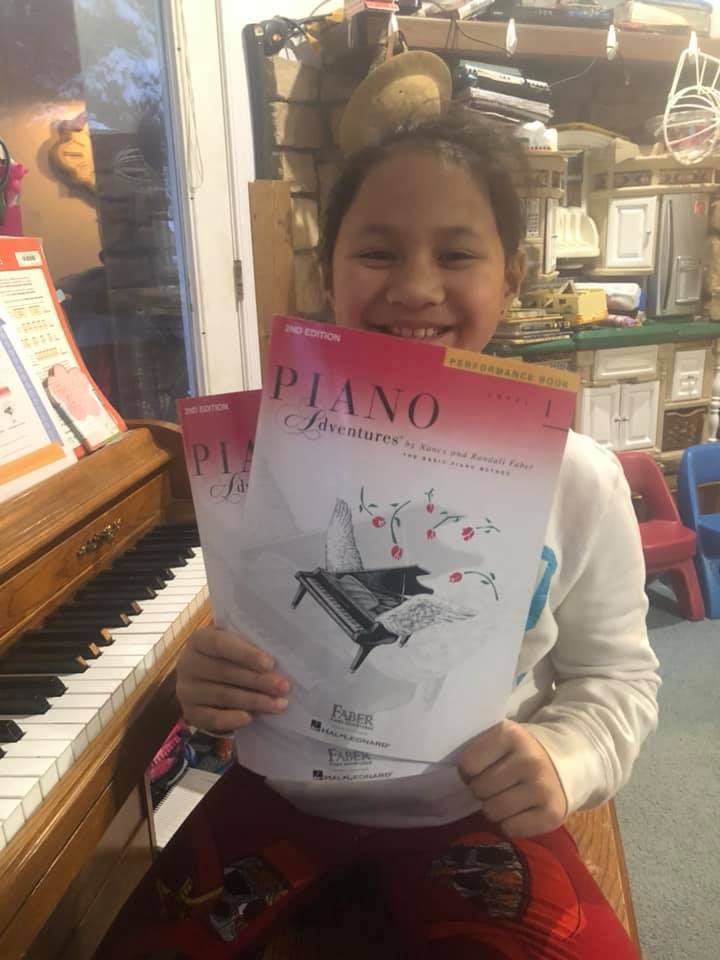 Student just starting her new Level 1 books