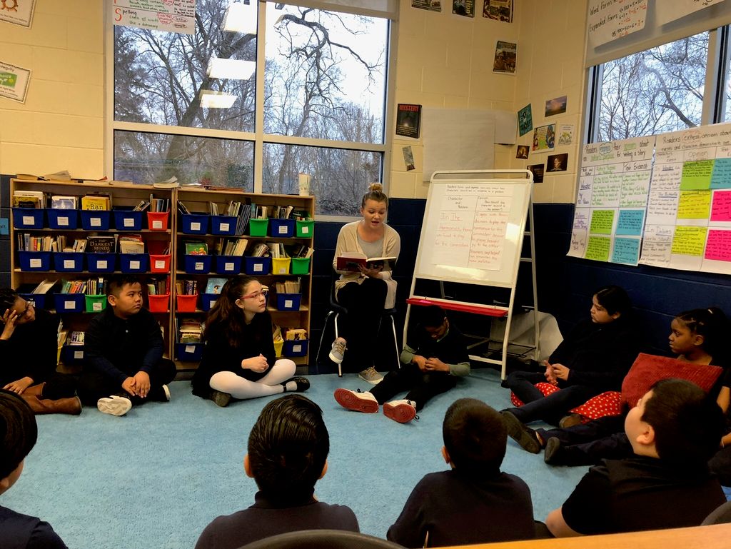 Reading to my 5th grade students. 