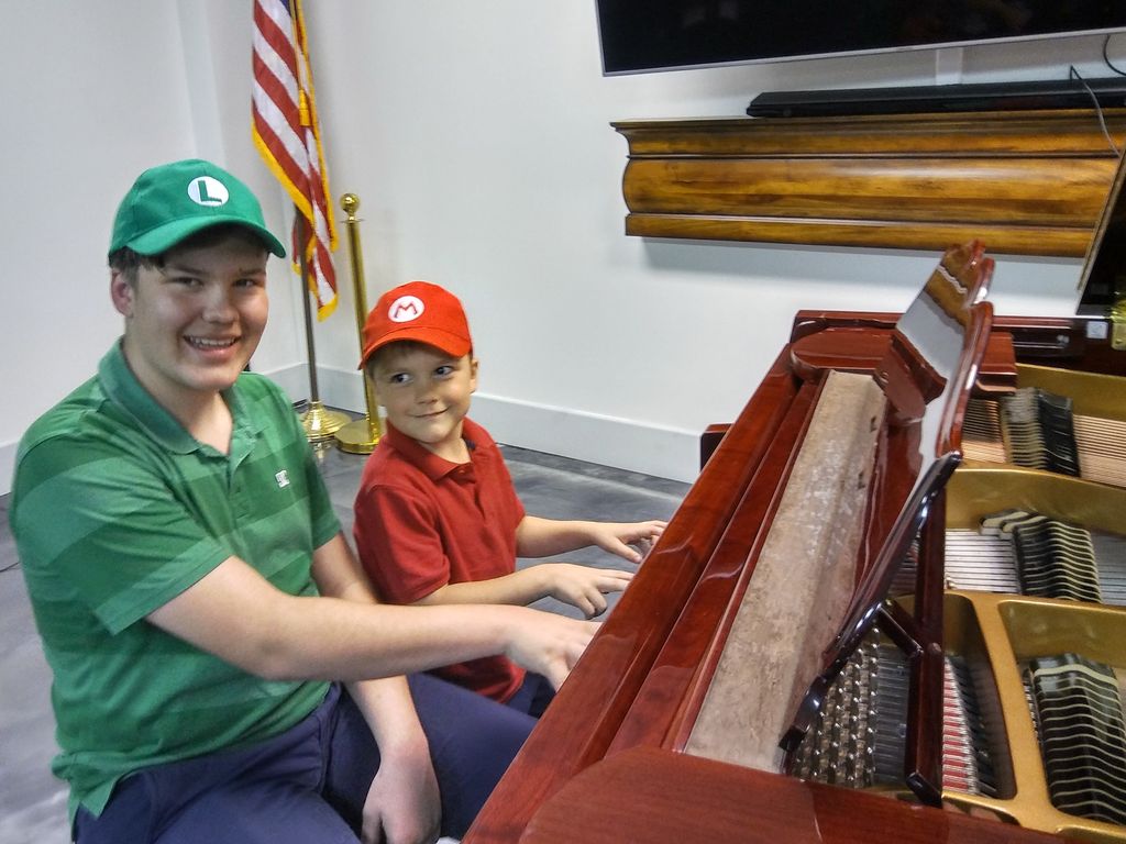 Brothers performing a Mario song