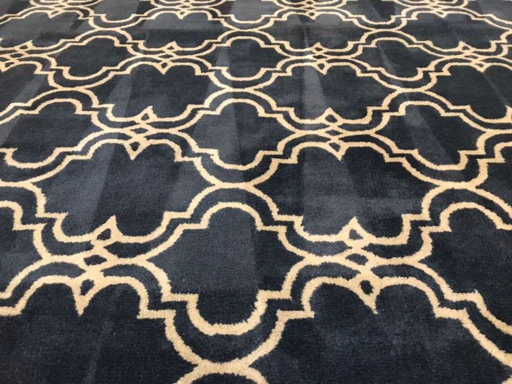 Wool rug up close with shark tooth dry strokes. 