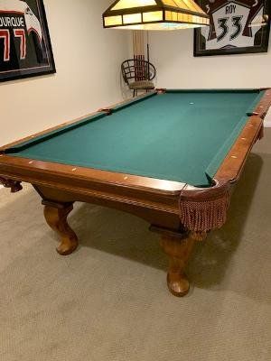Pool table disassembled, moved, and reassembled.  