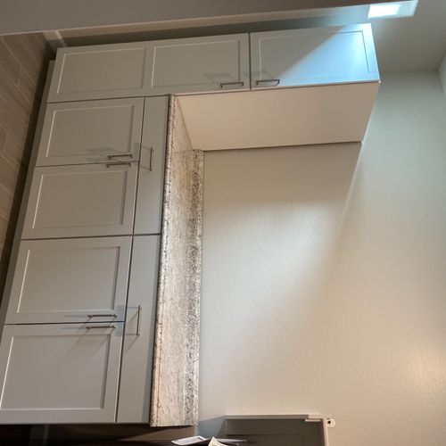 Laundry room cabinets/counter install.  Very pleas