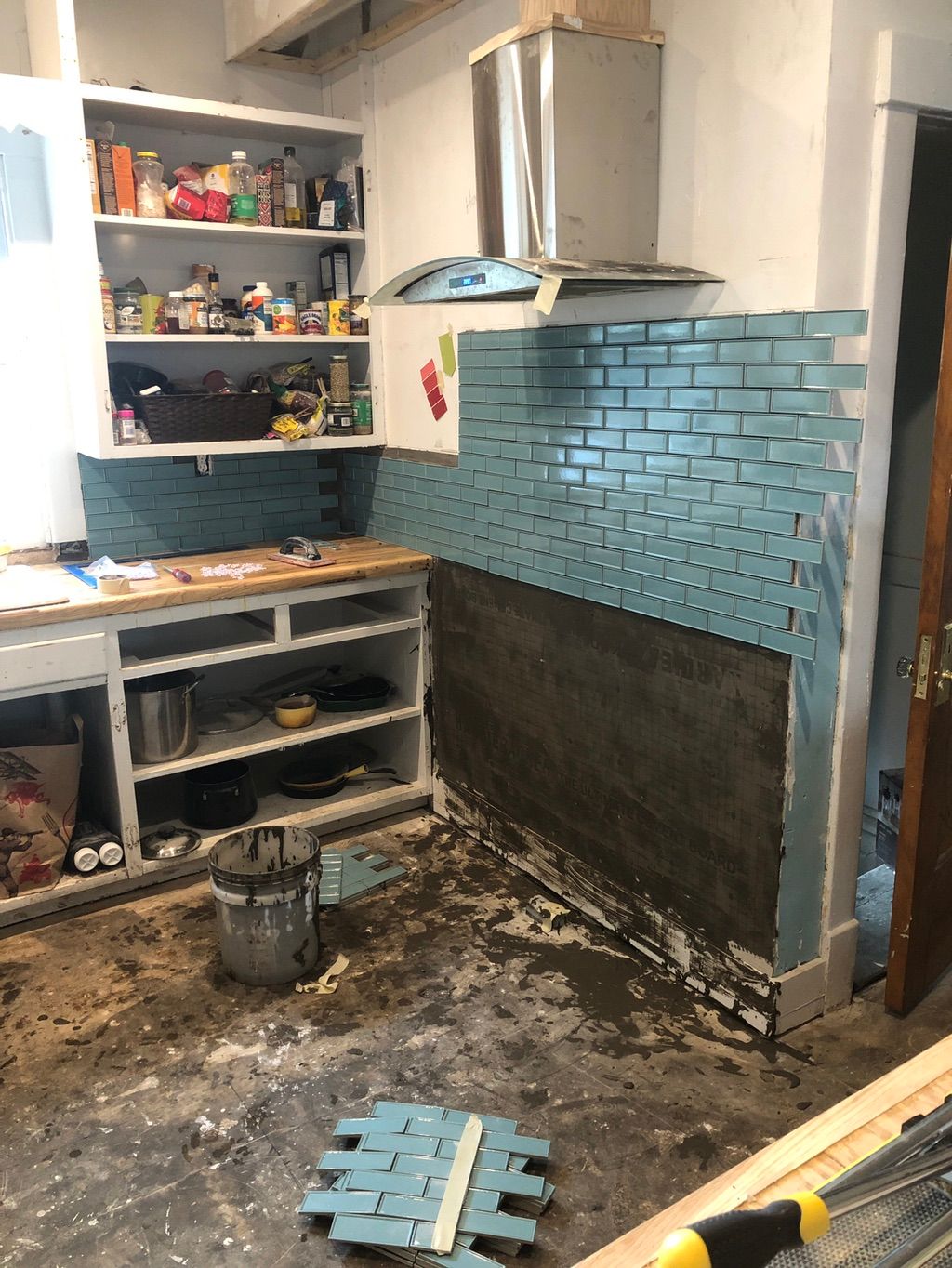 New tile backsplash and ventilation installed