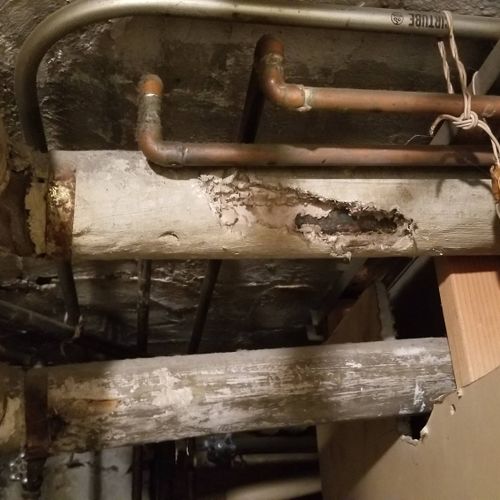 Asbestos on pipes.