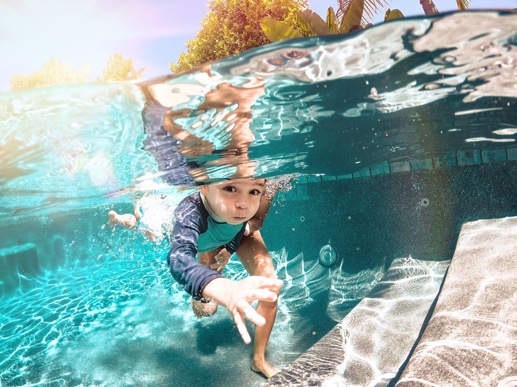 Child Swim Lesson. Eyes Open, Finding the wall. 