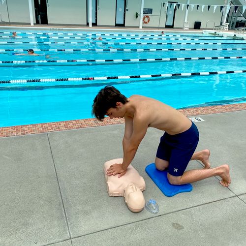 Lifeguard Certification Class, Practicing CPR. 