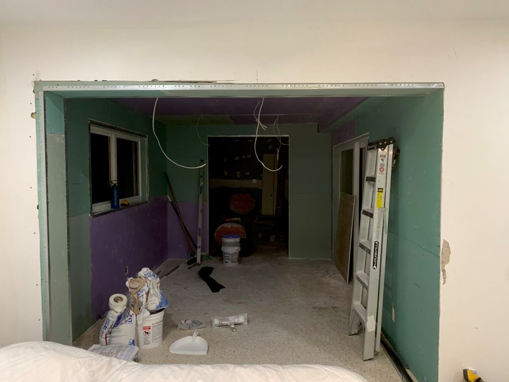 Drywall hanging 
Approximately $1,200
Materials an