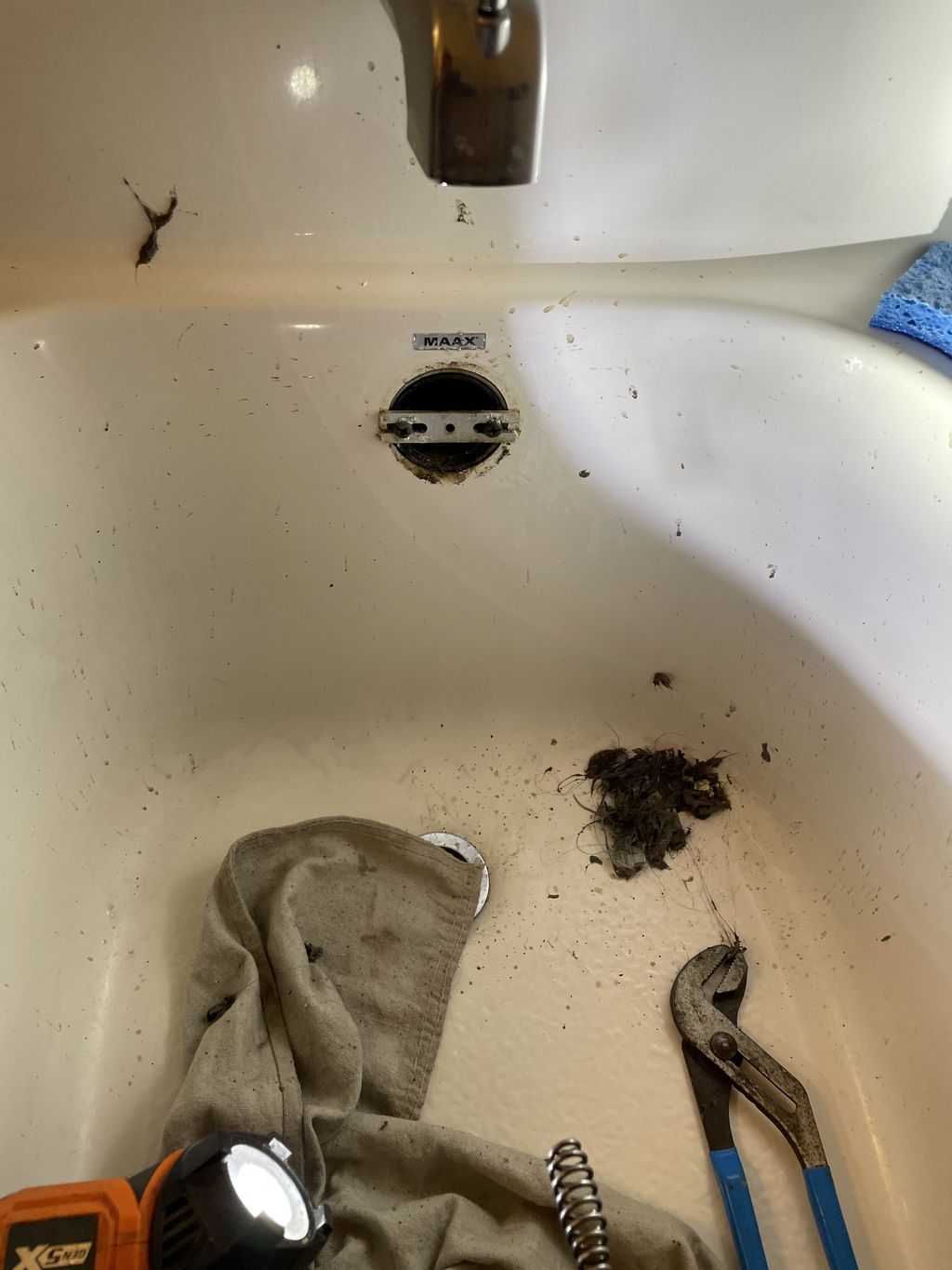 Tub drain clogged with hair