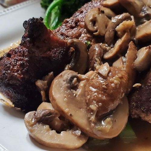Beef Short ribs with sauté mushrooms with a orange
