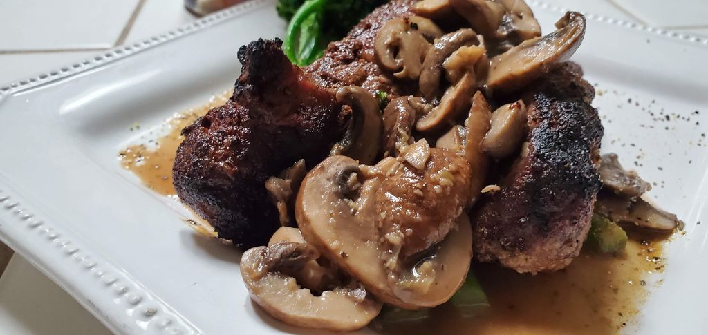 Beef Short ribs with sauté mushrooms with a orange