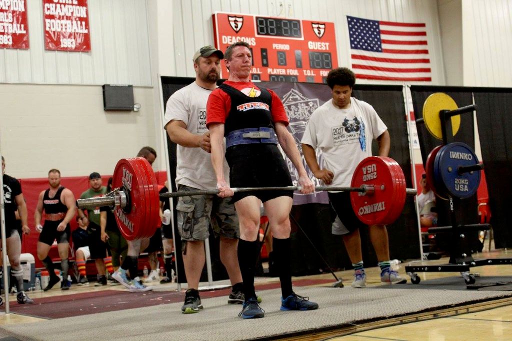 Me performing a 501 pound deadlift in a powerlifti