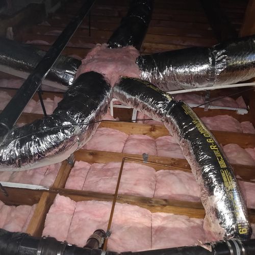 Air duct and fiberglass batt insulation installation