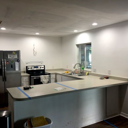 We had recessed lighting added to our kitchen. The