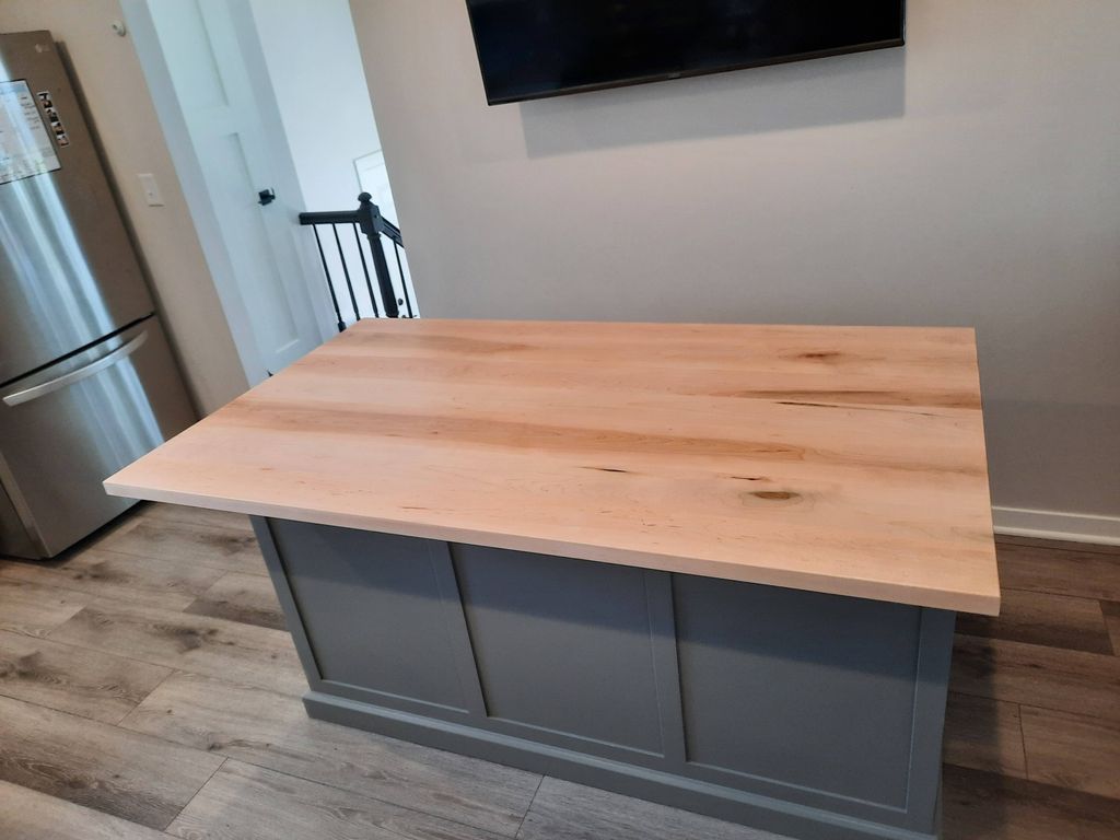 Refinished wood top.